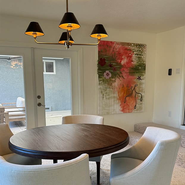 A dining room with a round table