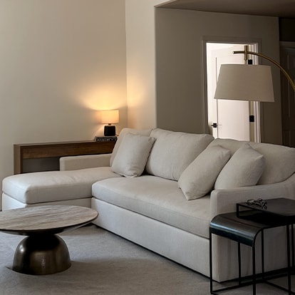 A sofa near a fireplace